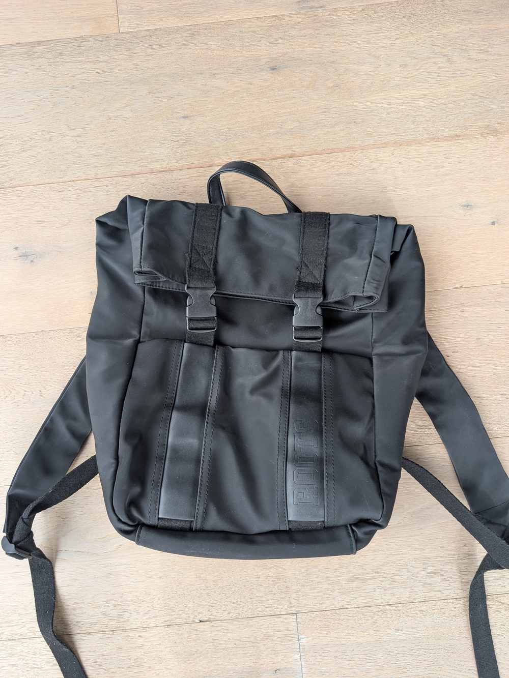 Roots Black Roll-Top Backpack with Buckle Closure